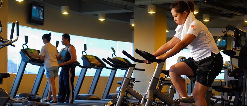 Micasa All Suites Hotel Kuala Lumpur Bagian luar foto A woman on a stationary bicycle
